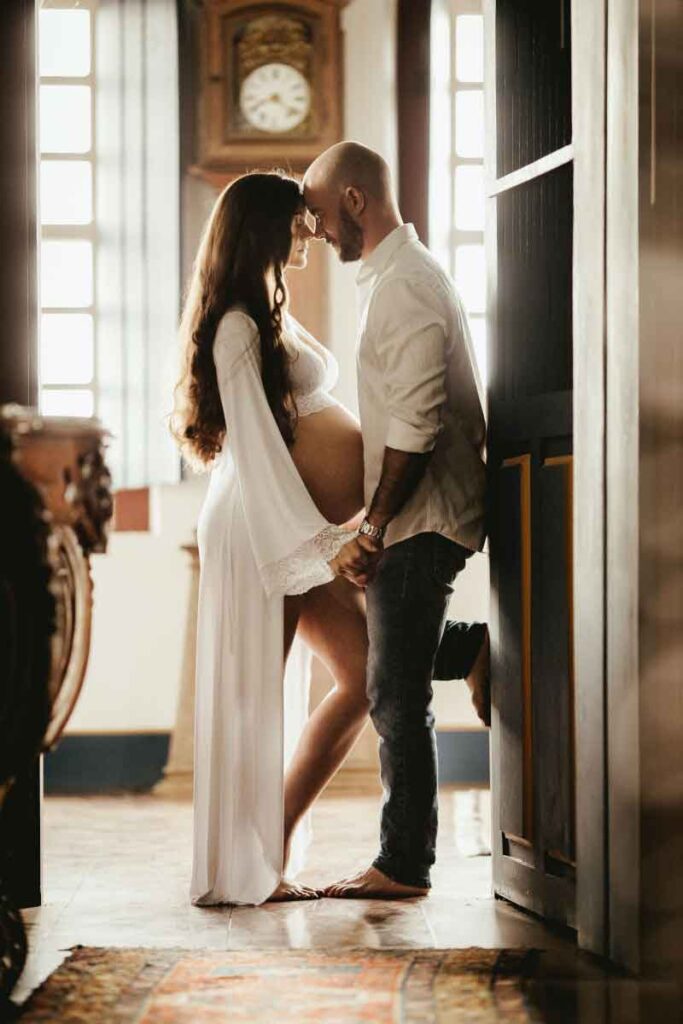 Pose 4. Looking Into Both of Your Eyes :- Couple Maternity Photoshoot Ideas